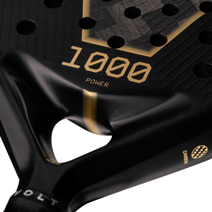 Heart detail of the Volt 1000 V5 padel racket, showcasing its new heart design with textured finish, 1000 letters and balance detail.