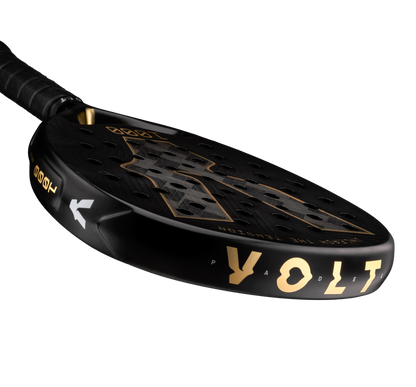 Top detail of the Volt 1000 V5 padel racket, showcasing the flashy gold Volt logo and the metallic gold details on the side